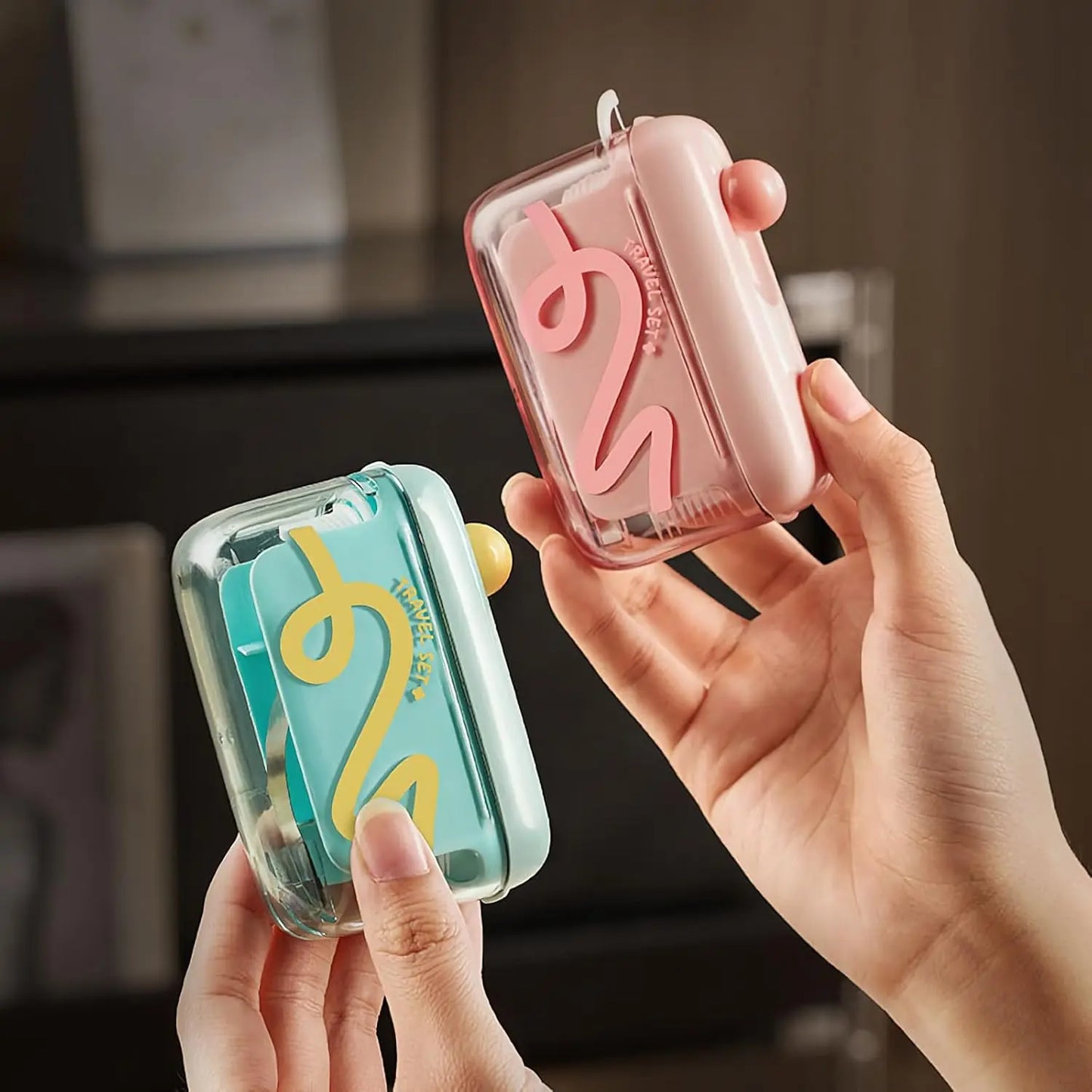 Travel-sized storage case - features an automatic pop-up dispenser, portable and refillable